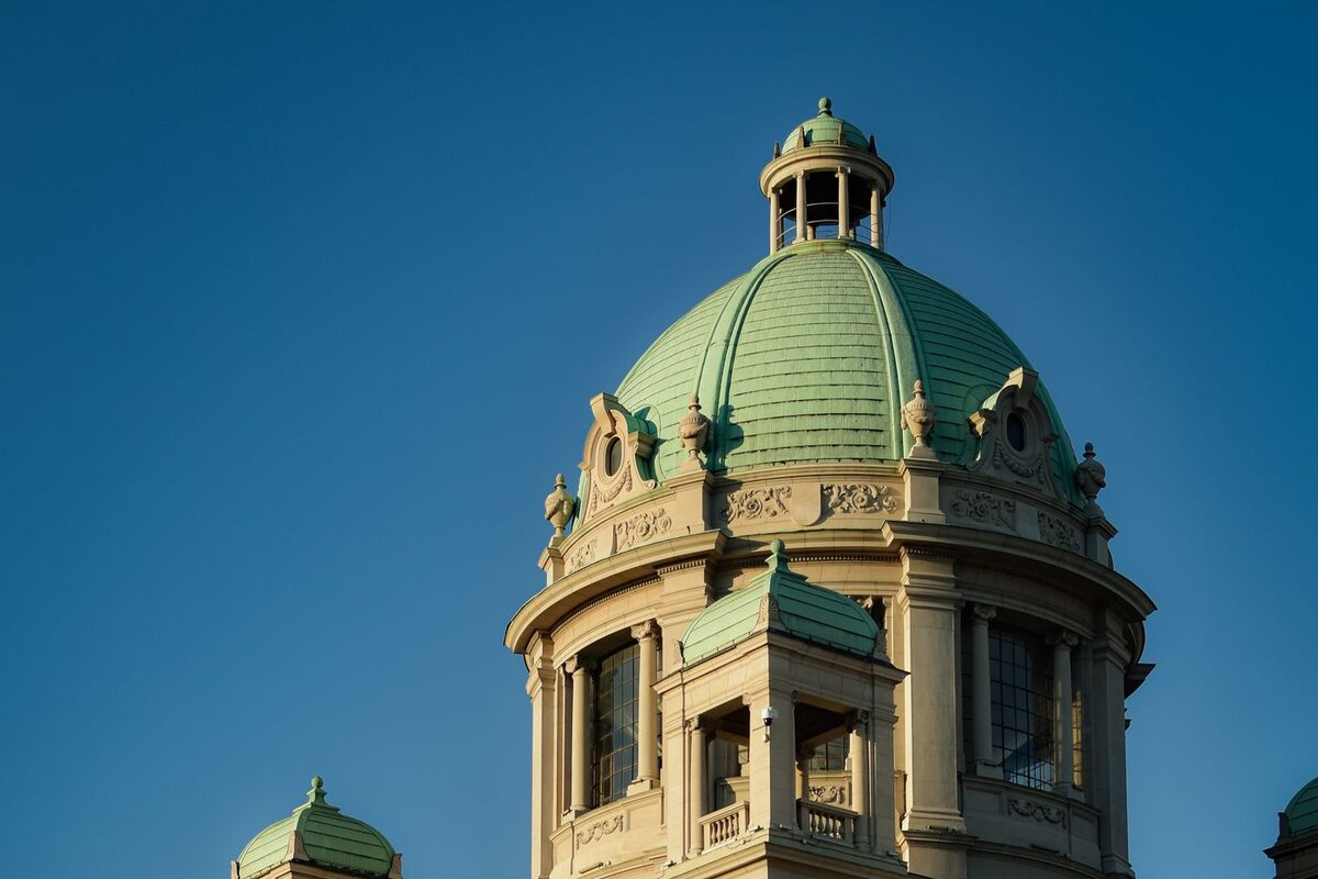 Ornate county courthouse building exterior under a blue sky - probate document filing